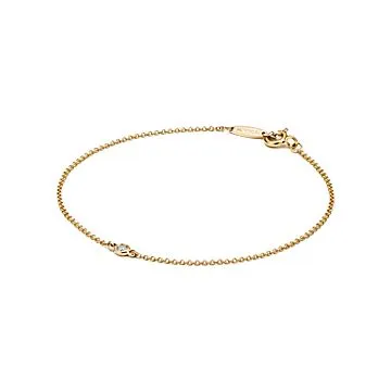 Elsa Peretti® Diamonds by the Yard® bracelet in 18k gold with a diamond. 
