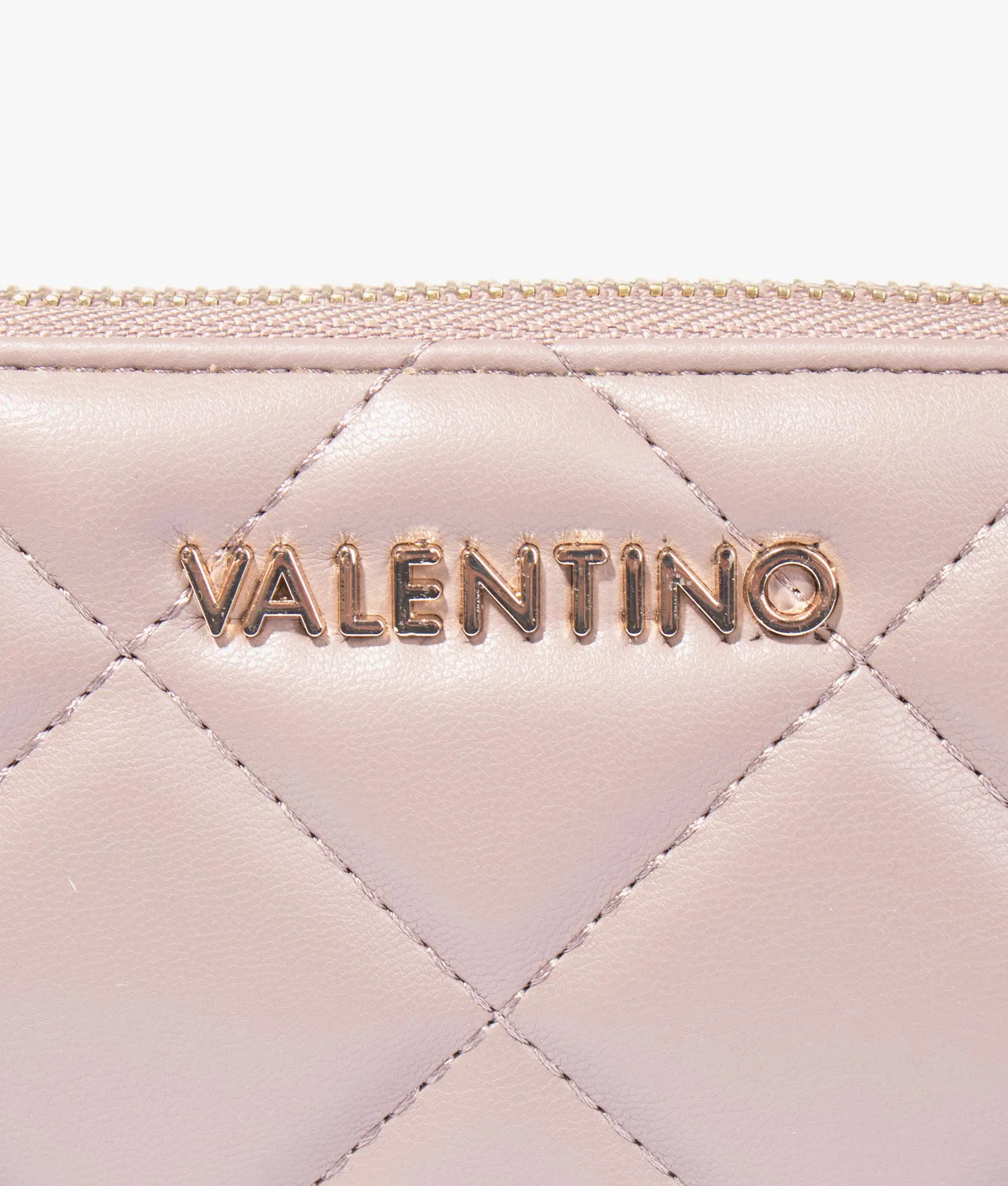 Ocarina quilted purse in taupe